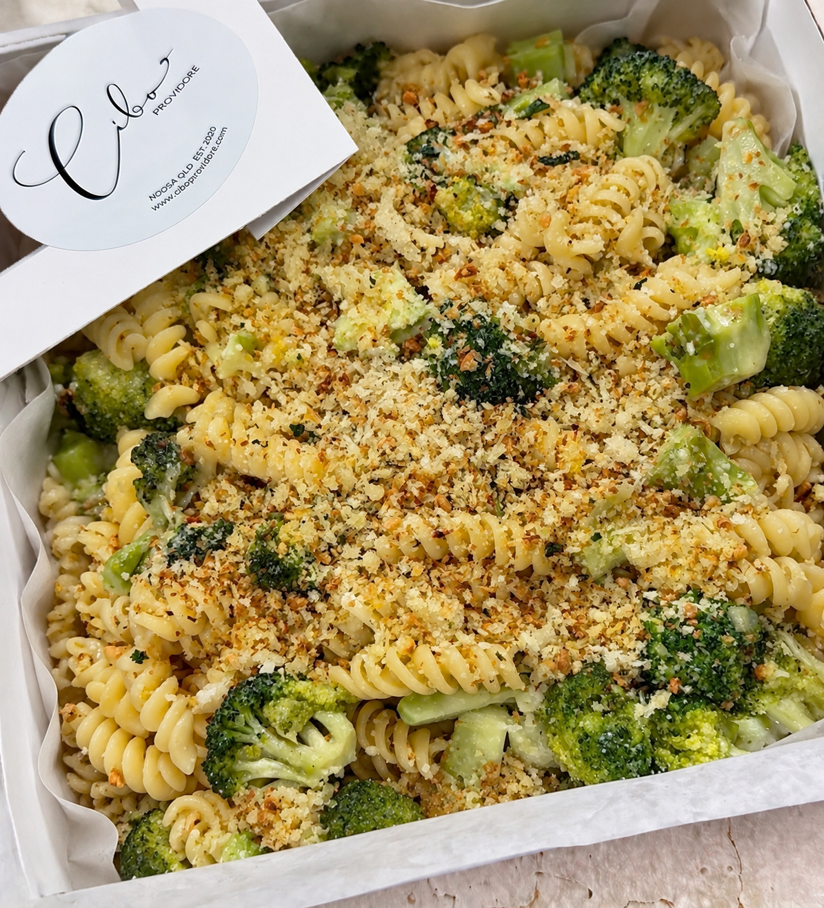Broccoli pasta salad in Cibo signature catering box