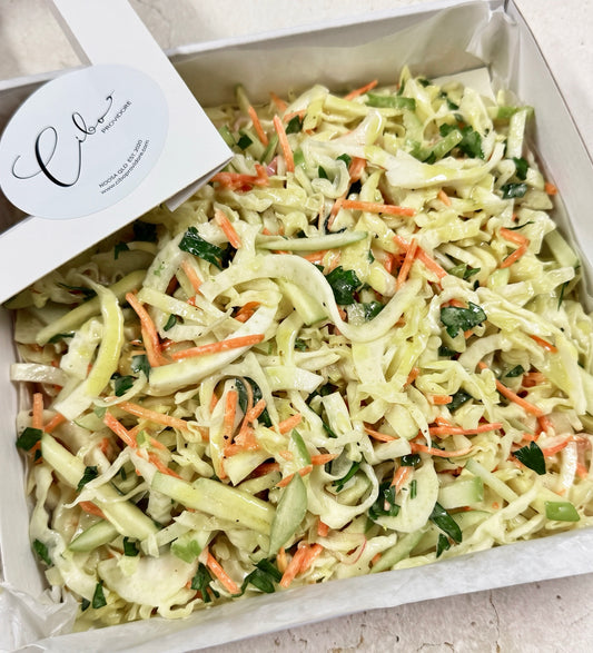 Cibo cabbage, carrot and apple slaw in white catering box