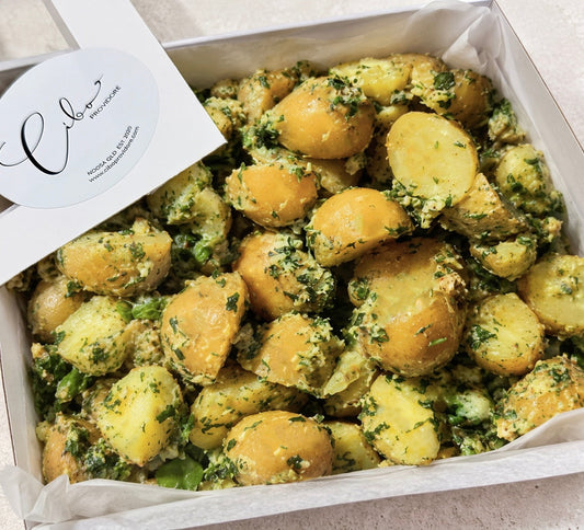 Herb-dressed baby potatoes in Cibo Providore white catering box