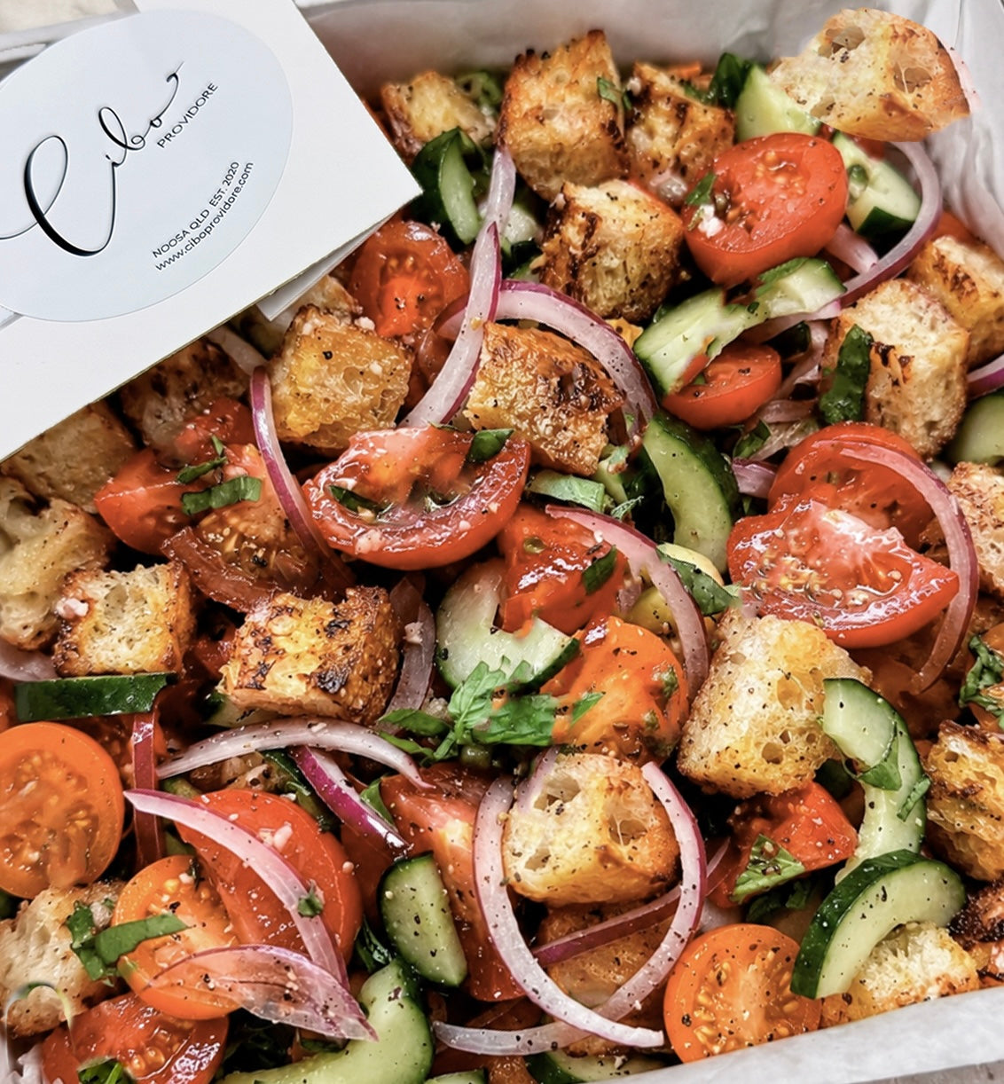 Cibo Panzanella salad in white catering box